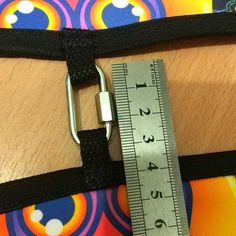 a close up of a person's arm with a measuring tape on it