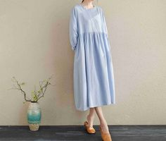 "Casual Big Size Linen Spring and Summer Long Dresses For Women/Soft Linen Dress ★Color:Blue ★Material:100% Linen ★Model Size: -- Model wear size M -- Model is 5'4\"/104lb -- Model measurements (bust 31\" / waist 28.3\" / hips 35\" ) ★ In order to make it more suitable for you. please tell me your body measurements : -- your Height -- your Weight -- your Bust circumference -- your Upper Arm circumference -- Phone number for shipping If you have some specific request or special character, such as Blue Relaxed Fit Solid Color Dress, Blue Relaxed Fit Dress, Relaxed Fit Blue Dress, Casual Blue Plain Dress, Casual Oversized Blue Dress, Oversized Blue Casual Dress, Blue Plain Dresses For Spring, Blue Plain Spring Dresses, Plain Blue Spring Dresses