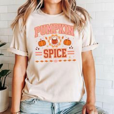 Pumpkin Spice T-shirt, Pumpkin Season, Pumpkin Spice Latte Sweatshirt, Pumpkin Sweat, Pumpkin Sweatshirt, Pumpkin Spice Season Sweatshirt 🎁 THE PERFECT GIFT FOR EVERYONE YOU LOVE 🎁 Surprise your friends, family, and loved ones with affordable, high-quality, personalized t-shirts. Each shirt is carefully hand-printed using the latest technology and eco-friendly, water-based inks. Thank you for choosing us! 💖 FINDING YOUR PERFECT SIZE 💖 Please refer to the size chart in the photos. We offer measurements for different clothing types and sizes. These shirts are unisex, so if you order your usual women's size, expect a looser fit. Note that the size chart measurements are not circumference. Clothing brands may vary depending on stock availability. 🛒 HOW TO ORDER 🛒 Carefully read all the i Love Surprise, Pumpkin Sweatshirt, Pumpkin Sweatshirts, Pumpkin Spice Season, Pumpkin Season, Pumpkin Seasoning, One Drop, Clothing Brands, Pumpkin Spice Latte