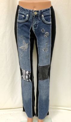 "These comfortable yet stylish jeans are the best you will ever wear. The patented process allows us to repurpose jeans and re-create an art to wear piece that gets people talking. The medium wash denim is embellished with doves and roses in rhinestones. The inserts on the front and back of the jeans are in black and white neutral prints. The black spandex side and inseams create an optical illusion that slims your legs. Sizes XXS-L. PLEASE CHECK YOUR SIZE YOU WILL HAVE TO GO DOWN A SIZE. Inseam Repurpose Jeans, Bling Jeans, Boho Jeans, Denim Art, People Talking, Peace Dove, Stylish Jeans, Neutral Prints, Embellished Jeans