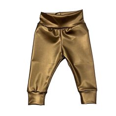 "These faux leather vegan baby leggings are made from a stretchy gold poly spandex blend material.  The fabric has a matte surface on the front and soft spandex knit backing. The stretchy yoga style waistband makes them super comfy for your little one and ensures lots of wear. All seams have been serged for durability. SIZING: *all measurements have been taken laying flat and may vary slightly* (W) - width of waist laying flat (I) - inseam (crotch to bottom)  (L) - length (very top to very bottom) 0-3M   - W- 6.25\"  I- 6\"  L- 12\" 3-6M   - W- 6.75\"  I- 7\"  L- 14\" 6-9M   - W- 7\"   I- 8.5\"   L- 15\" 9-12M  - W- 7.25 I- 9.5\"  L- 17\" 12-18M - W- 7.75\" I- 11.25\" L 18.75\" 18-24M - W- 8\"  I- 12.25\"  L- 20\" 2T  - W- 8.5\"  I- 14\"  L- 21.25\" 3T  - W- 8.75  I- 16.25\"  L- 24\" 4T  - Vegan Baby, Yoga Style, Leather Baby, Baby Leggings, Yoga Fashion, Kids Pants, Little One, Kids Outfits, Faux Leather