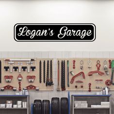 there is a garage with many tools hanging on the wall and in front of it