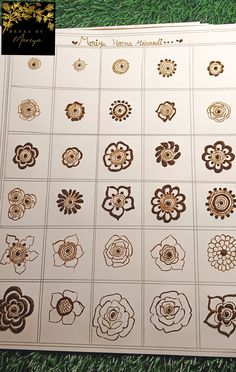 a sheet of stickers with different designs on the top and bottom of each one