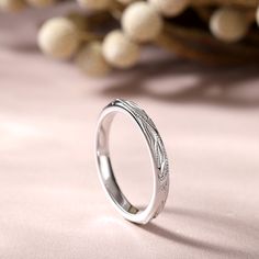 A beloved nature symbol, the leaf depicts the sweetness and wonder of love. Crafted in sterling silver, this band features an intricate leaf pattern. This band is interesting, different, and truly beautiful. It is a great jewelry gift to express love, witness your love, romantic and sweet.Weight: 2.3 gWidth: 2.3 mmHeight: 1.7 mmThickness: 1.7 mmMaterial: 925 SilverPlating Color: Silver Engraved Sterling Silver Couple Rings In White Gold, Elegant Hypoallergenic Engraved Ring, Sterling Silver Engraved Ring With Diamond Cut For Gift, Elegant Etched Sterling Silver Rings, White Gold Etched Promise Ring, Adjustable Hypoallergenic Elegant Engraved Ring, Sterling Silver Hypoallergenic Engraved Ring For Anniversary, Elegant Engraved Sterling Silver Stackable Rings, White Gold Rings With Decorative Band As Gift