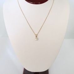 Please note we ship on Tuesdays and Fridays only due to living in a Rural community. A Vintage 14k Solid Gold Cultured Pearl Pendant 12k gf Chain.  c1980s from my own personal collection. Purchased in USA The pearl pendant is in very good vintage condition Marked 14k and a makers mark that I do not recognize. The chain is marked 12k gf. The pearl appears as 6mm-7mm and the pendant is over 1.5cms in length. The chain is 40cm or 15.75 inches long. Total weight is 2.6gms. All measurements and weights are approximate only. Vintage Pearl Pendant, Classic 14k Yellow Gold Pearl Necklace, Classic 14k Gold Pearl Necklace For Anniversary, Classic 14k Gold Necklaces With Bail, Classic Yellow Gold Necklace With Bail Detail, Gold 14k Pearl Necklace For Anniversary, 14k Yellow Gold Pearl Necklace For Anniversary, Classic Gold Plated Pearl Necklace For Anniversary, Rural Community