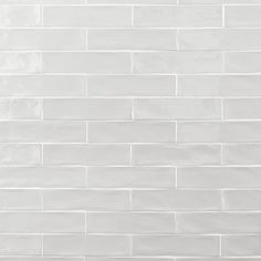 a white brick wall with no mortars on it