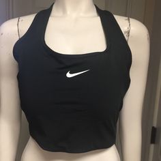 Great Sports Bra/Crop Top By Nike! In A Versatile/Festive Black With Iconic Logo Detailing, This Medium Support Bra Top Has Sporty Style. Racer Back Styling (With Lots Of Exposed Flesh) Shows Off Your Toned Shoulders And Back. Front Pocket Easily Holds Your Phone. Dri-Fit Technology Keeps You Cool, Dry, And Comfortable. Removable Modesty Pads Included. Size 1x (Armpit To Armpit: 18” Length: 12.5”) And Size 3x (Armpit To Armpit: 19” Length: 13”) Available. New With Tags! Casual T-back Sports Bra For Sports, Sporty High Stretch T-back Top, Athleisure T-back Top For Training, Sporty High-stretch T-back Top, Sporty T-back Crop Top For Workout, High Stretch T-back Tops For Sports, Fitted T-back Sportswear Activewear, Fitted T-back Tank Top For Sports, Sports Stretch T-back Crop Top