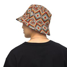 Inspired by the rich heritage of traditional Native American design textiles, our reversible bucket hat blends cultural motifs with contemporary style. Featuring a captivating Native American pattern on one side and serene blue on the other, this hat offers versatility and flair for every outing. Embrace the spirit of indigenous artistry with every wear, whether you're exploring the outdoors or simply soaking up the sun. This reversible bucket hat can be worn on both sides, making it easy to mat American Sunset, Native American Pattern, Country Wall Clock, Protecting Yourself, Native American Patterns, Reversible Bucket Hat, American Pattern, Native American Design, Decorative Blankets