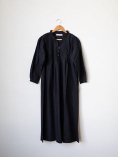 We couldn't be more excited to introduce our newest additions to our nightgown collection. This versatile night dress, reminiscent of days spent harvesting and feeding chickens, offers more than just comfort. For us, it's an "everything dress" designed for cozy autumn evenings and productive work-from-home days. It suits any virtual meeting or school drop-off. Crafted from premium cotton poplin, its gentle drape and jet-black hue hide anything you don't want seen. These gowns are perfect for the Black Night Gown, Feeding Chickens, Cotton Night Dress, Black Nightgown, Virtual Meeting, Productive Work, Spooky Stories, Cotton Nightgown, Cozy Autumn