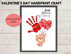 valentine's day handprint craft with a teddy bear holding balloons and hearts on it