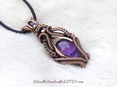 "Wire Wrapped Amethyst Pendant, Empath Protection Amethyst Necklace, Elven Jewelry, Protection Amulet Necklace, Healing Amethyst Gift for Her Unique Handmade Artisan Jewelry !! Original Designs by ArtsvilleHandcrafted If you love unique designs and Amethyst then...this beauty is perfect for you!! This piece has a gorgeous Amethyst, garnet and is created with Pure Copper Wires. IMPORTANT Select your choice of length for the necklace. All Jewelry is Gift Wrapped!! And dispatched within 1-2 working Empath Protection, Wire Wrapped Stone Jewelry, Elven Jewelry, Protection Amulet, Amulet Necklace, Wire Wrapping Stones, Wire Weaving, Amethyst Necklace, Amethyst Pendant