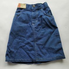 These are true vintage. They probably are from the 80s. They are made in USA and are 100% cotton They have a pin stripe detail. The back is elastic and it is still in good stretchy condition. Girls size 6X Retro Denim Skirt For Spring, Retro Fitted Denim Skirt, 90s Style Medium Wash Denim Skirt, Vintage Denim Blue Denim Skirt, Vintage Cotton Denim Skirt, 90s Blue Cotton Denim Skirt, 90s Style Blue Cotton Denim Skirt, Vintage Denim Blue Skirt, 90s High Waist Cotton Denim Skirt