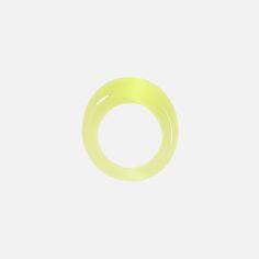 a yellow ring on a white background