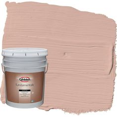 a pink paint with a white bucket next to it