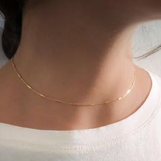 ⊹ A simple, dainty choker necklace with a sparkly, reflective finish made with a beautiful tiny rectangles chain. It is a perfect accessory for everyday wear because it looks great with just about anything. Wear it alone or layered. ⊹ The necklace is handmade, finely-detailed, high quality, will not tarnish and is safe to use in regular water. To keep its shine and color avoid applying perfume or lotion directly on the jewel or any chemicals such as found in pool or sea water◂▸◂▸◂▸◂▸◂▸◂▸◂▸◂▸◂▸◂▸ Minimalist Clavicle Chain Necklace With Rectangular Links, Minimalist Choker With Delicate Chain Link, Minimalist Choker With Delicate Link Chain, Minimalist Link Choker With Delicate Chain, Dainty Rectangular Chain Necklace With Adjustable Chain, Dainty Rectangular Chain Necklace, Simple Jewelry Earrings, Jewelry Necklace Simple, Jewelry White Gold