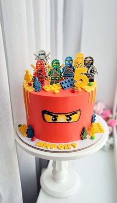 a cake with lego characters on it