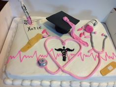 a cake decorated to look like a doctor's stethoscope and heartbeat