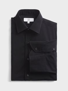 Make a statement in this black cotton dress shirt-a modern twist on the classic, and the perfect foundation piece for showcasing your accessories. Going to the dark side has never looked better. 100% fine cotton Convertible front placket (accepts button studs) Convertible barrel cuffs (accepts cufflinks) Black Cotton Dress Shirt, Suit Prom, Black Cotton Dress, Button Studs, Black Cotton Dresses, Black Tux, Foundation Piecing, Tuxedo Shirts, Perfect Foundation