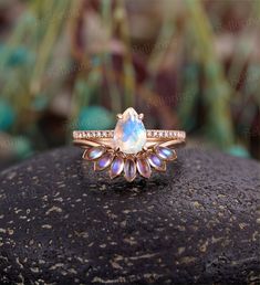 Vintage moonstone engagement ring set marquise cut moonstone wedding band half eternity moissanite rings rose gold anniversary bridal set Link of the wedding band: https://www.etsy.com/listing/625133328/vintage-wedding-band-opal-women-rose?ref=listings_manager_grid Back to Belloring shop: https://www.etsy.com/shop/BrilliantRing?ref=l2-shopheader-name --------------------Specifications---------------------- Engagement Ring Center Stone - 6*8mm Moonstone Side stones - 0.1ct Moissanite Moissanite C Moonstone Wedding Band, Rose Gold Wedding Set, Opal Wedding Ring Set, Wedding Ring Sets Vintage, Opal Wedding Band, Moonstone Engagement Ring Set, Rose Gold Moissanite Ring, Ring Rosegold, Vintage Engagement Rings Unique