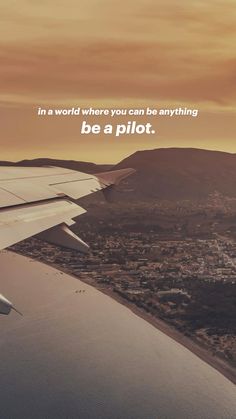 an airplane wing with the words in a world where you can be anything be a pilot