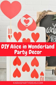 diy alice in wonderland party decor with red hearts on it and the words, diy alice in wonderland party decor