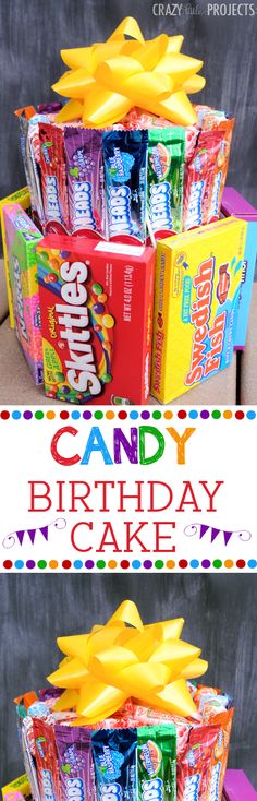 a birthday cake made out of candy bars and wrapped in yellow ribbon with the words candy birthday