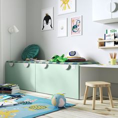 a child's room with toys and books on the floor