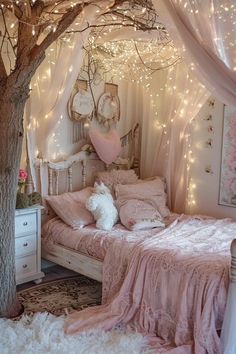 a bedroom decorated in pink and white with fairy lights