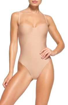 This sleek, contouring bodysuit supports your curves while smoothing and cinching in your core. The lightly lined, molded cups with underwire enhance your bust and the removable straps let you wear the shapewear your way. Back hook-and-eye closure Molded underwire cups Removable, adjustable straps Thong back Snap cotton-lined gusset 61% polyamide, 39% elastane Hand wash, line dry Imported Elegant Full Coverage Bodysuit For Summer, Elegant Full Coverage Summer Bodysuit, Elegant Full Coverage Bodysuit With Lined Body, Elegant Full Coverage Smoothing Bodysuit, Elegant Full Coverage Lined Bodysuit, Elegant Fitted No-show Shapewear, Elegant Sculpting Backless Shapewear, Fitted Push-up Bodysuit With Lined Body, Fitted Push-up Bodysuit With Built-in Bra