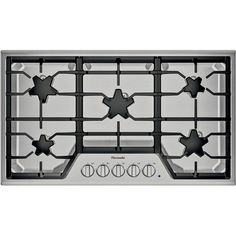 a stainless steel stove top with four burners