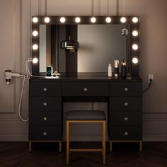 a vanity with lights and a stool in front of it