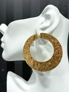 The Textured Gold Hoop Earrings are a stunning statement piece. Featuring a large, bold design with an intricate textured finish, these earrings are perfect for adding a touch of glamour to any outfit. Lightweight and easy to wear, they bring an elegant and contemporary flair to your style. Hammered Hoop Earrings For Party, Elegant Hammered Hoop Earrings For Party, Elegant Textured Jewelry For Party, Chic Textured Metal Earrings, Bold Design Earrings For Party, Gold Stud, Bold Design, Gold Texture, Gold Hoop