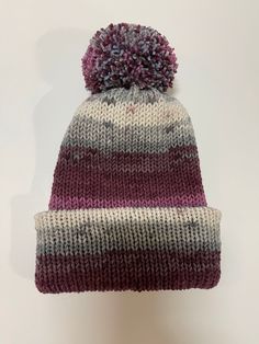 *This is a Sentro knitted beanie made in soft acrylic yarn. *Beanie is double layered and reversible with a removable pom-pom.   *The beanie fits an older teen and average adult. * All of my handmade items come from a non-smoking home.   *Sales are final. *Ready to ship. Care Instructions: Remove pom-pom and hand-wash.  Line air dry. Note:  If you would like an item made to order, feel free to contact me. THANK YOU for supporting my small business 😊. Warm Acrylic Bonnet One Size, Warm Acrylic Beanie, Warm Acrylic Bonnet, Warm Gray Acrylic Beanie, Warm Acrylic Beanie, One Size Fits Most, Warm Knit Beanie One Size, Soft Knit Acrylic Beanie Cap, Warm Acrylic Beanie One Size Fits Most, Knitted Beanie One Size