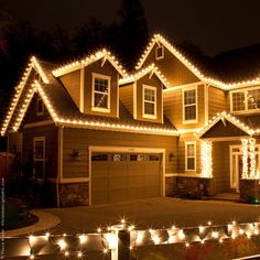 a house with christmas lights on the roof