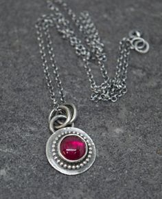 International deliveries in 2-4 business days as standard shipping. Totally handmade from 925 solid sterling silver. Beautiful necklace with an 8 mm Lab created ruby bezel set in sterling silver. The necklace goes with a 40 cm polo silver chain. A synthetic gem material is one that is made in a laboratory, but which shares virtually all chemical, optical, and physical characteristics of its natural mineral counterpart. It comes gift wrapped and ready for giving! ✿REGISTERED MAIL WITH TRACKING NU Sterling Silver Necklace For May Birthstone Jewelry Making, Sterling Silver May Birthstone Necklace, Sterling Silver Pendant Necklace With May Birthstone, Sterling Silver Pendant Necklace For May Birthstone, Silver May Birthstone Pendant Necklace, Silver Pendant Necklace For May Birthstone, Red Sterling Silver Necklace With Round Pendant, Silver Necklace With Gemstone For Birthday, Silver Gemstone Necklace For Birthday