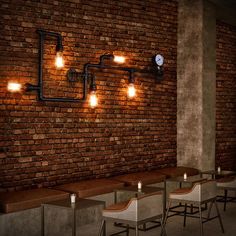 a brick wall with lights on it and some chairs in the foreground next to them