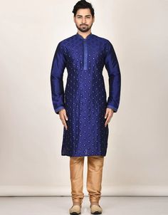 Designer Festival Wear Men's Kurta Pajama Processing Time : 20-25 Business Days Work : Machine Work Fabric: Top : Dhupion Silk Bottom : Dhupion Silk Dupatta : NA Color: Top : Royal Blue Bottom : Chiku Dupatta : NA #traditionaldressformens #traditionalwearmen #traditionalwearformen #menstraditionalwear #indiantraditionaldressformen #ethnicwearformen #indianethnicwearformen #traditionaldressmale #officialdressformen #ethnicwearmen #mendress #gentstraditionaldress #ethnicdressesformens Blue Silk Sherwani With Zari Work, Blue Art Silk Sherwani For Eid, Festival Blue Sherwani In Art Silk, Festive Blue Silk Sherwani, Festive Blue Art Silk Sherwani, Festival Art Silk Blue Sherwani, Festival Blue Art Silk Sherwani, Blue Art Silk Kurta With Long Sleeves, Blue Silk Sherwani For Eid