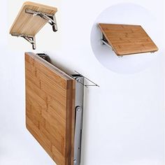 a cutting board mounted to the side of a wall