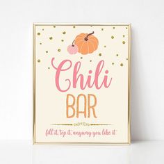 a sign that says chilli bar with a pumpkin on the top and gold confetti around it