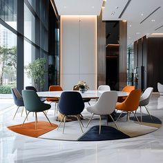 a dining room table with chairs and a rug on the floor in front of it