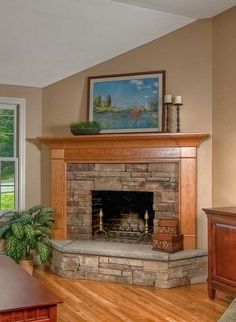 a living room filled with furniture and a fire place in the middle of a room