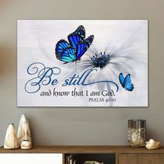 a blue butterfly with the words be still and know that i am god