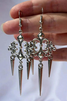 Victorian era earrings in silver color Elegant Alloy Clip-on Earrings For Party, Elegant Alloy Earrings As Gift, Elegant Alloy Earrings For Gift, Silver Alloy Drop Clip-on Earrings, Silver Alloy Hoop Earrings As Gift, Ornate Sterling Silver Earrings With Elegant Design, Alloy Drop Hoop Earrings, Formal Alloy Drop Earrings, Nickel-free Alloy Earrings For Party