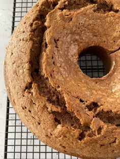 a close up of a doughnut on a cooling rack