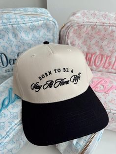 New arrival in our bridal collection, born to be a stay at home wife.  This hat makes everyone laugh and is so cute~  Black Vintage snapback adjustable cap ships immediately unless on preorder! Stay At Home Wife, Trucker Wife, Vintage Trucker Hat, Vintage Snapback, Baby Ready, Vintage Trucker Hats, School Collection, Pink Bridal, Blue Bow