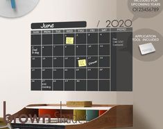 a desk with a clock and calendar on it