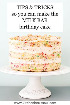 a cake with white frosting and sprinkles on top that says tips & tricks so you can make the milk bar birthday cake