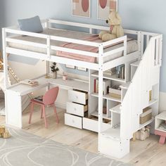 a white loft bed with stairs and desk underneath it in a child's bedroom