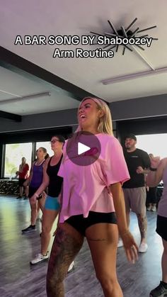 a group of people in a dance class with the caption'a bar song by shaboozey arm routine '