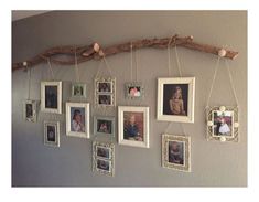 a family photo hanging on a wall with multiple frames attached to the wall above it